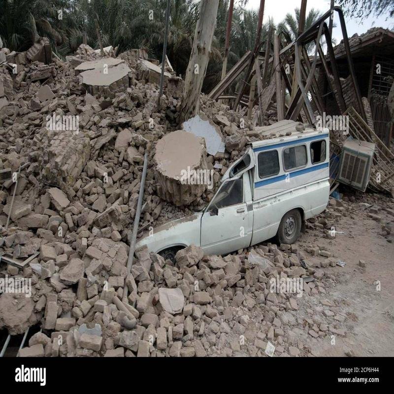 The catastrophic earthquake in Bam, Iran, resulted in the widespread destruction of this historically significant city. The scale of the devastation is shocking. - Image 2